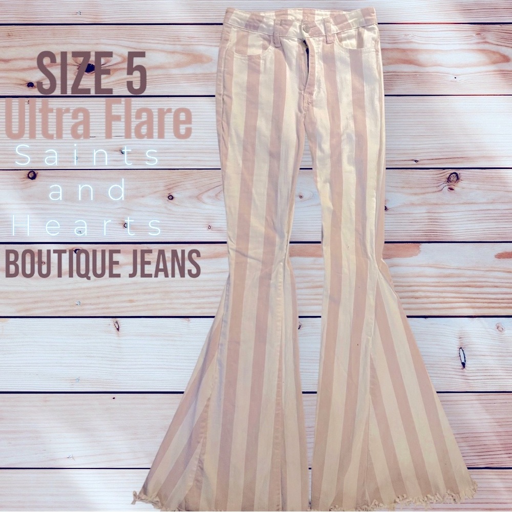 Size 5 “Saints and Hearts” ultra flare boutique jeans.